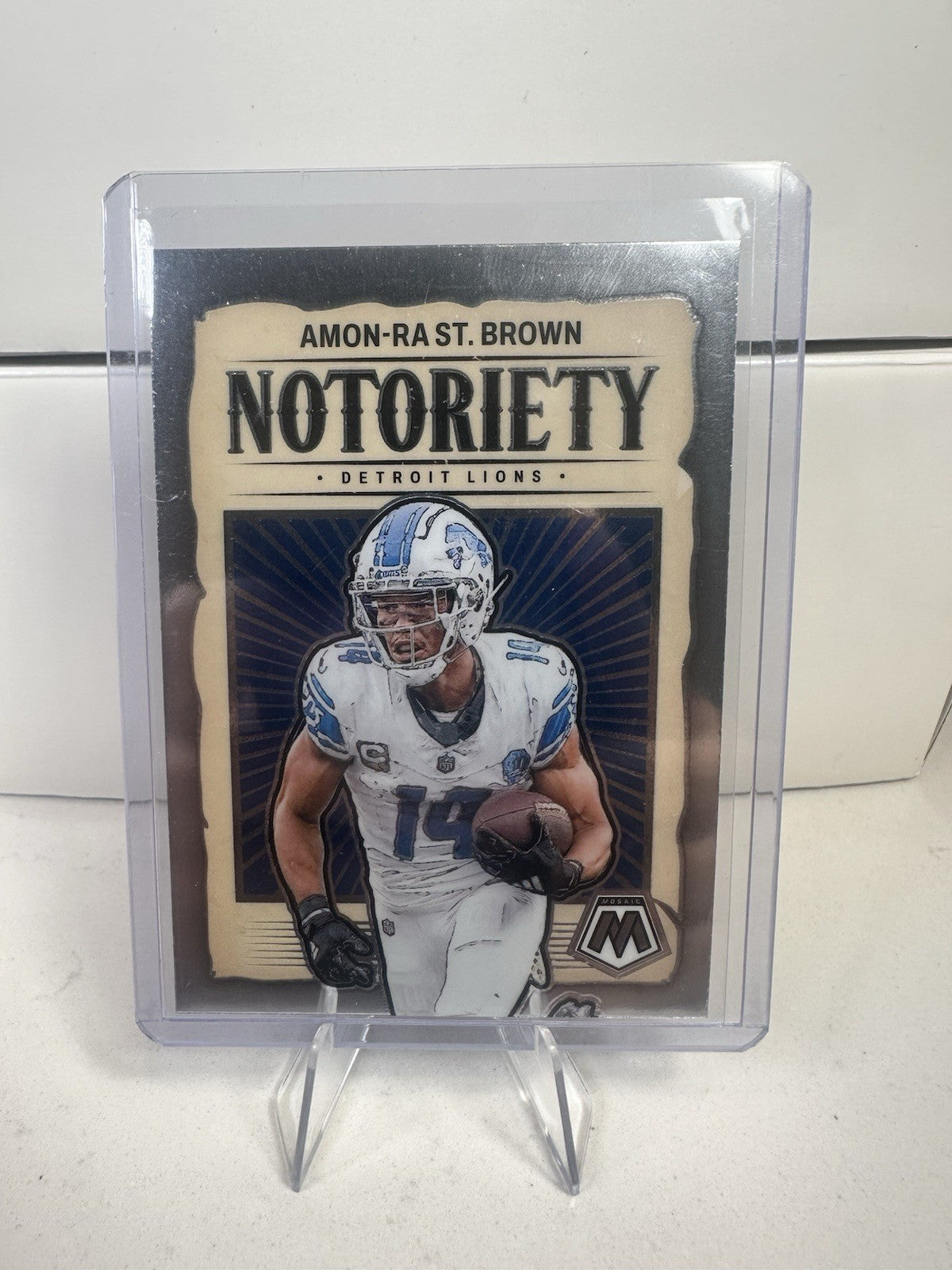 Amon-Ra St Brown 2024 Panini Mosaic Football Notoriety Insert Detroit Lions #12